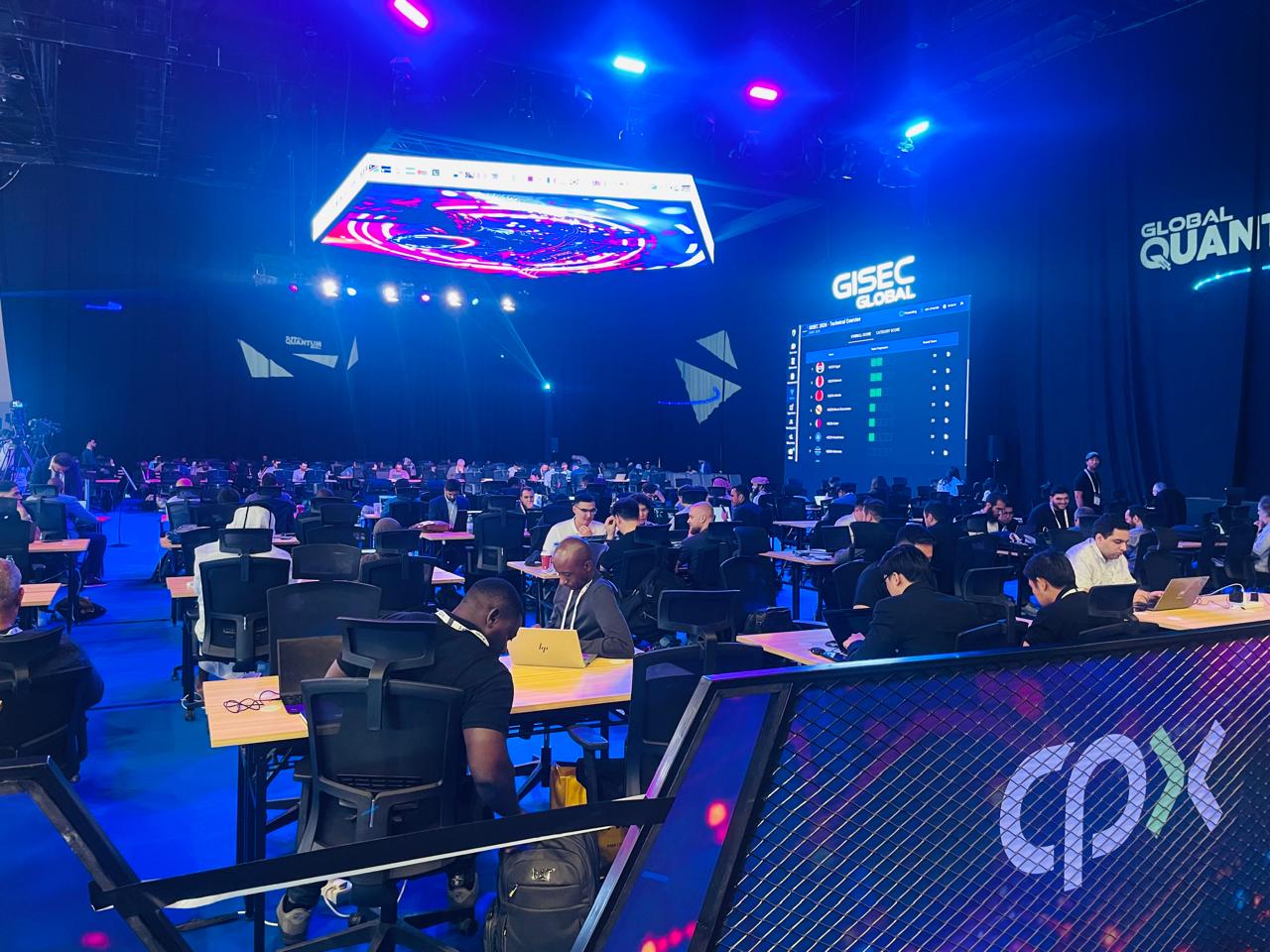 Participants seated with laptops in the Global Quantum X challenge hall at GISEC Global 2026.